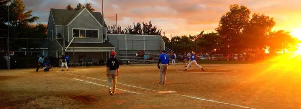 Softball tournament at dusk in Petoskey, MI